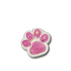 Squishy con forma de pata de gato en el agua