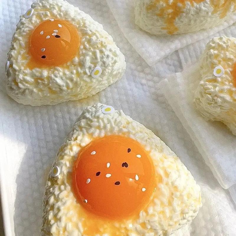 Dry Rice Squishy Liquid Egg Yolk Rice Ball Bread Squishy β FunnyPippi